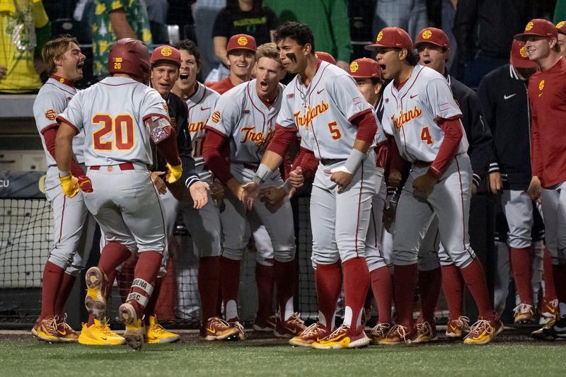 USC celebrates a home run by Isaac Cadena (20) as the Oregon Ducks host the USC Trojans on May 14, 2026, in Eugene, Oregon.