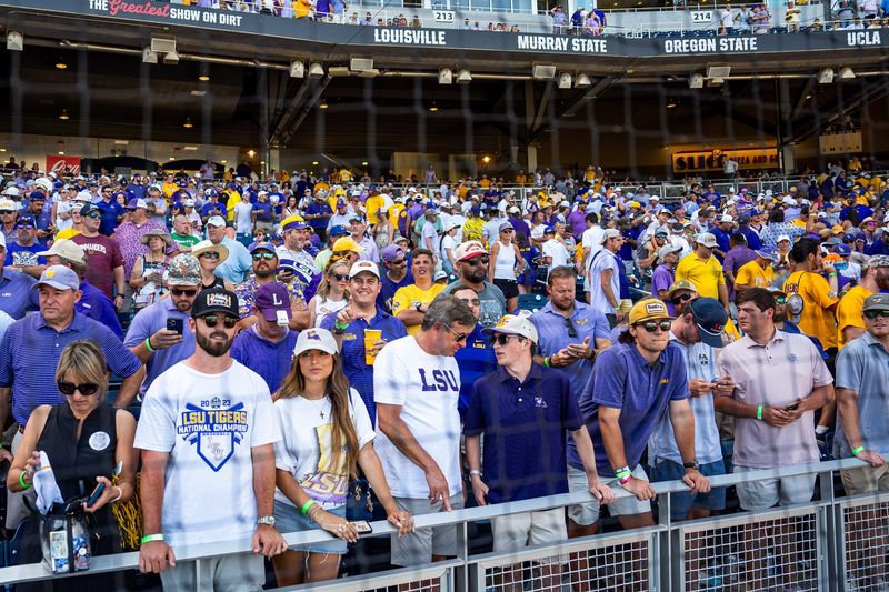 Jun 22, 2025; Omaha, Neb, USA; LSU Tigers celebrate during awards after winning the College World Series at Charles Schwab Field. Mandatory Credit: Dylan Widger-Imagn Images