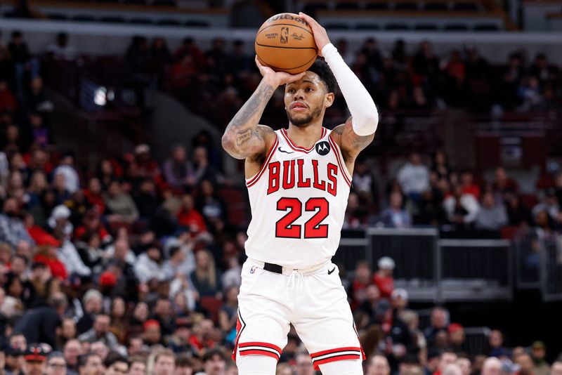 Feb 19, 2026; Chicago, Illinois, USA; Chicago Bulls guard Anfernee Simons (22) shoots against the Toronto Raptors during the second half at United Center. Mandatory Credit: Kamil Krzaczynski-Imagn Images