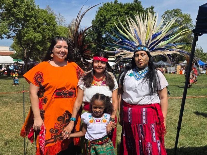 Círculo Azteca founder Gabriela Yaocihuatl Armenta, left, participates in an Azteca Mexica New Year ceremony.