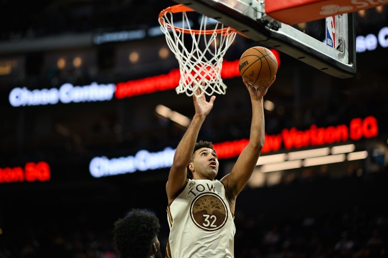 Dec 22, 2025; San Francisco, California, USA; Golden State Warriors forward Trayce Jackson-Davis (32) shoots against the Orlando Magic in the fourth quarter at Chase Center. Mandatory Credit: Eakin Howard-Imagn Images