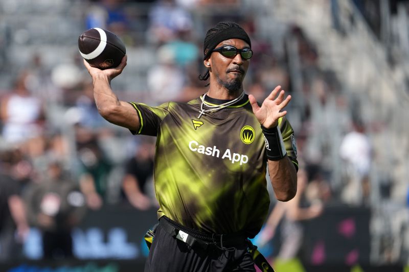 Mar 21, 2026; Los Angeles, CA, USA; Wildcats FFC quarterback Jayden Daniels throws the ball during the Fanatics Flag Football Classic at BMO stadium. Mandatory Credit: Kirby Lee-Imagn Images