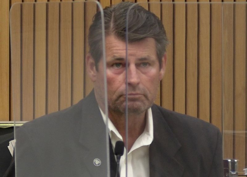 Scott Erickson, defendant in a wrongful death case, testifies in a Van Nuys courtroom on May 22.
