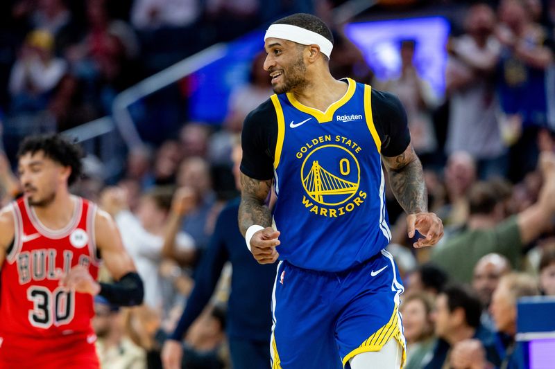 Mar 10, 2026; San Francisco, California, USA; Golden State Warriors guard Gary Payton II (0) celebrates during the fourth quarter against the Chicago Bulls at Chase Center. Mandatory Credit: Bob Kupbens-Imagn Images