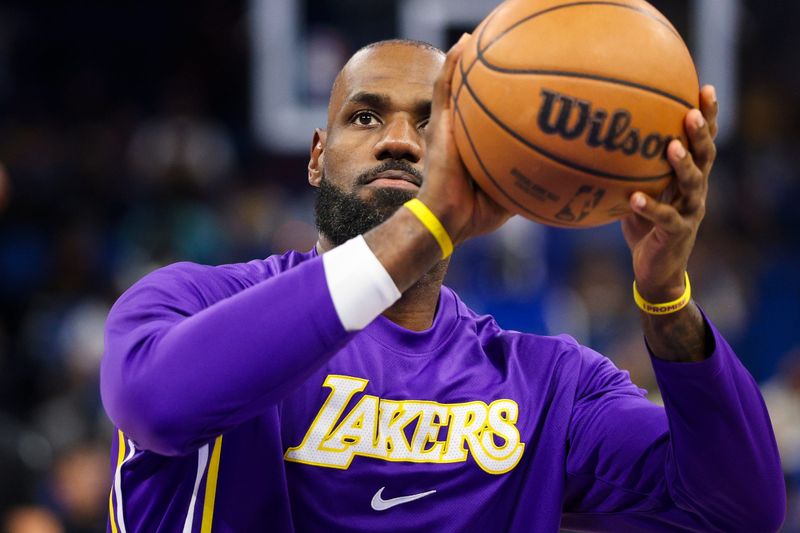 Mar 21, 2026; Orlando, Florida, USA; Los Angeles Lakers forward LeBron James (23) warms up before a game against the Orlando Magic at Kia Center. Mandatory Credit: Nathan Ray Seebeck-Imagn Images