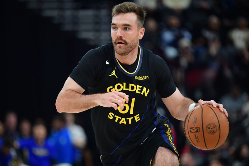 Apr 12, 2026; Inglewood, California, USA; Golden State Warriors guard Pat Spencer (61) controls the ball against the Los Angeles Clippers during the first half at Intuit Dome. Mandatory Credit: Gary A. Vasquez-Imagn Images