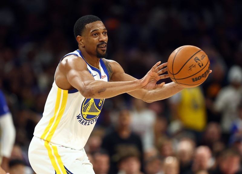 Apr 17, 2026; Phoenix, Arizona, USA; Golden State Warriors guard De'Anthony Melton (8) against the Phoenix Suns during the play-in rounds of the 2026 NBA Playoffs at Mortgage Matchup Center. Mandatory Credit: Mark J. Rebilas-Imagn Images