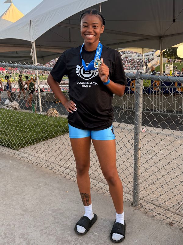Calabasas High junior sprinter Malia Rainey poses with her gold medal after winning the CIF-State title in the girls 100 meters with a time of 11.38 seconds on Saturday, May 30, 2026, at Buchanan High School in Clovis.