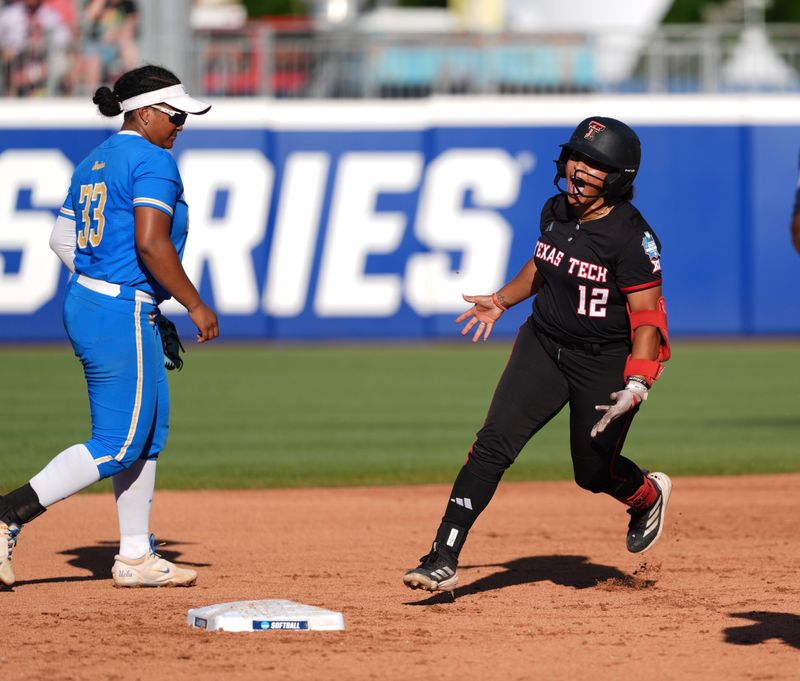 Jasmyn Burns (12) rounds the bases after hitting a homerun during the Women's College World Series softball game between Texas Tech Red Raiders and the UCLA Bruins at Devon Park in Oklahoma City, May 31, 2026.