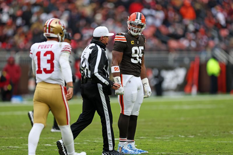 Nov 30, 2025; Cleveland, Ohio, USA; Cleveland Browns defensive end Myles Garrett (95) reacts after a play against San Francisco 49ers quarterback Brock Purdy (13) during the second half at Huntington Bank Field. Mandatory Credit: Scott Galvin-Imagn Images