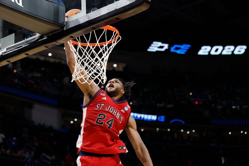 Mar 27, 2026; Washington, DC, USA; St. John's Red Storm forward Zuby Ejiofor (24) goes in for a dunk against the Duke Blue Devils in the second half during a Sweet Sixteen game of the East Regional of the men's 2026 NCAA Tournament at Capital One Arena. Mandatory Credit: Amber Searls-Imagn Images