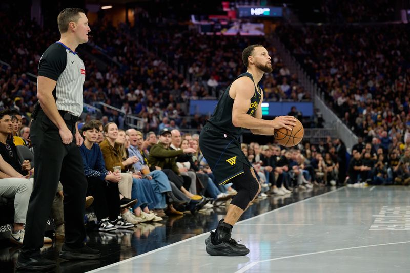 Nov 21, 2025; San Francisco, California, USA; Golden State Warriors guard Stephen Curry (30) looks to shoot a three-point shot wearing Li Ning Jimmy Butler 4 (JB4) Black Knight shoes against the Portland Trail Blazers during the fourth quarter at Chase Center. Mandatory Credit: Robert Edwards-Imagn Images