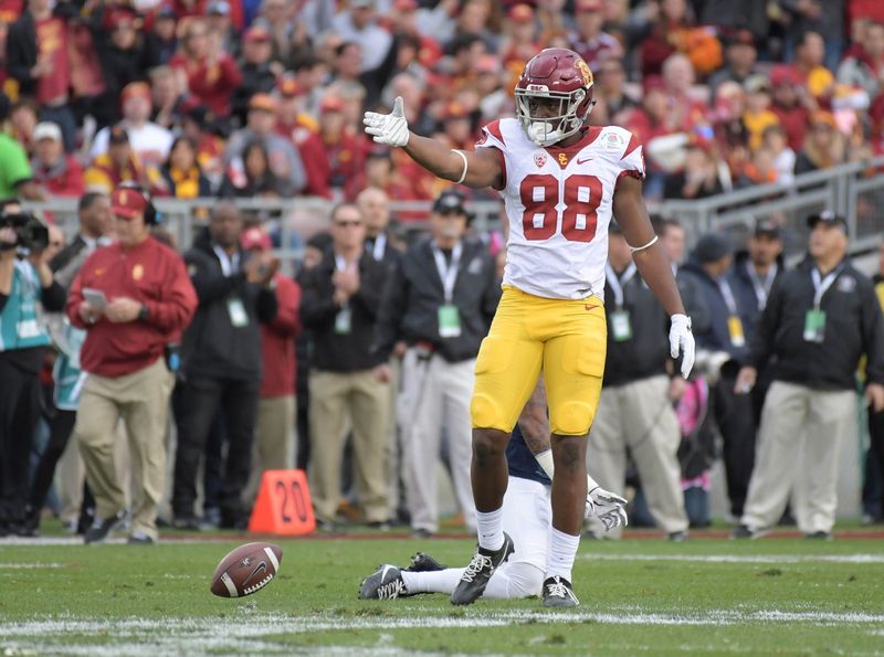 Jan 2, 2017; Pasadena, CA, USA; USC Trojans tight end Daniel Imatorbhebhe (88) celebrates after a first down in the first quarter during the 103rd Rose Bowl at Rose Bowl. USC defeated Penn State 52-49 in the highest scoring game in Rose Bowl history. Mandatory Credit: Kirby Lee-USA TODAY Sports