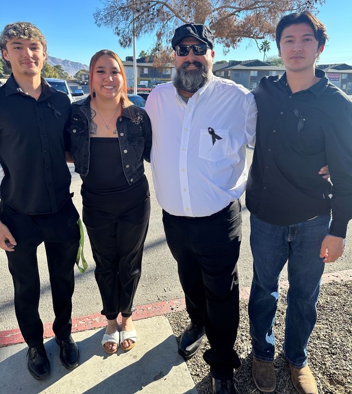 Tulare's Corral family, pictured, left to right: Matthew, Arlette, dad James Sr., and James, pose for a photo. The Corral men all played baseball at Tulare Western High School.