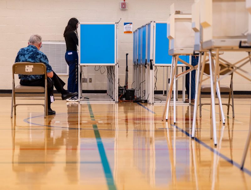 A voter fills out out her ballot at the community center polling place in Palm Desert in the primary election on June 2, 2026.