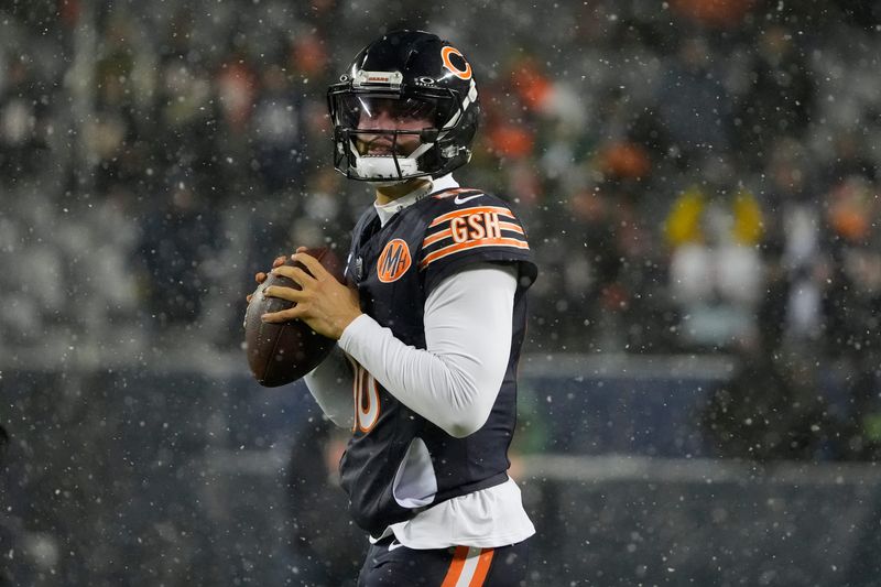 Jan 10, 2026; Chicago, IL, USA; Chicago Bears quarterback Caleb Williams (18) warms up prior to an NFC Wild Card Round game against the Green Bay Packers at Soldier Field. Mandatory Credit: David Banks-Imagn Images