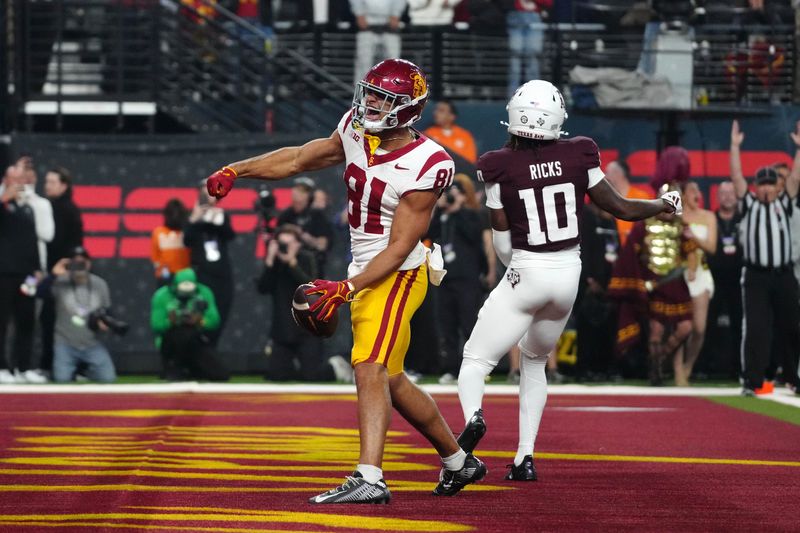 Dec 27, 2024; Las Vegas, NV, USA; iSouthern California Trojans wide receiver Kyle Ford (81) celebrates after scoring on a 7-yard touchdown reception against the Texas A&M Aggies at Allegiant Stadium. Mandatory Credit: Kirby Lee-Imagn Images