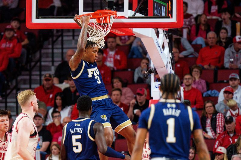 Nov 8, 2025; Lincoln, Nebraska, USA; Florida International Panthers forward Corey Stephenson (3) dunks the ball against the Nebraska Cornhuskers during the first half at Pinnacle Bank Arena. Mandatory Credit: Dylan Widger-Imagn Images