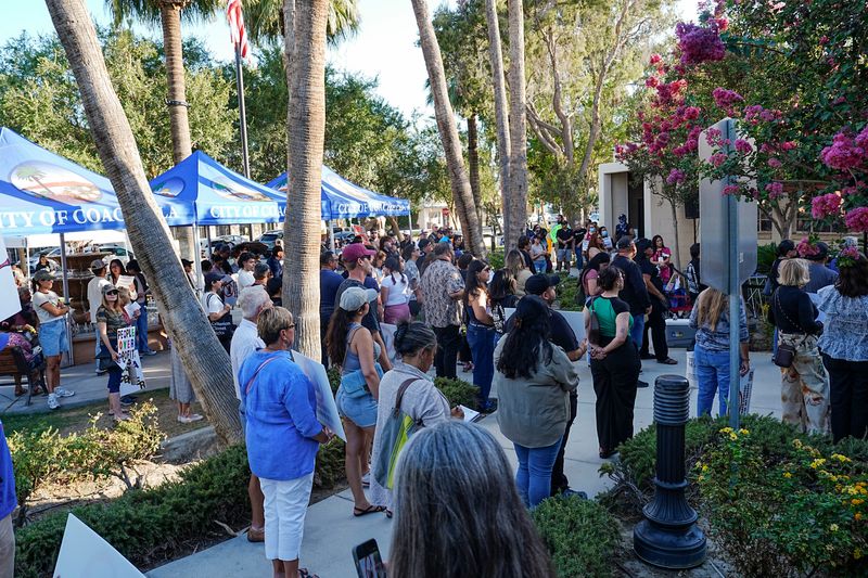 A large crowd gathers outside of the city council chambers to oppose development of a data center in Coachella, Calif., June 4, 2026.
