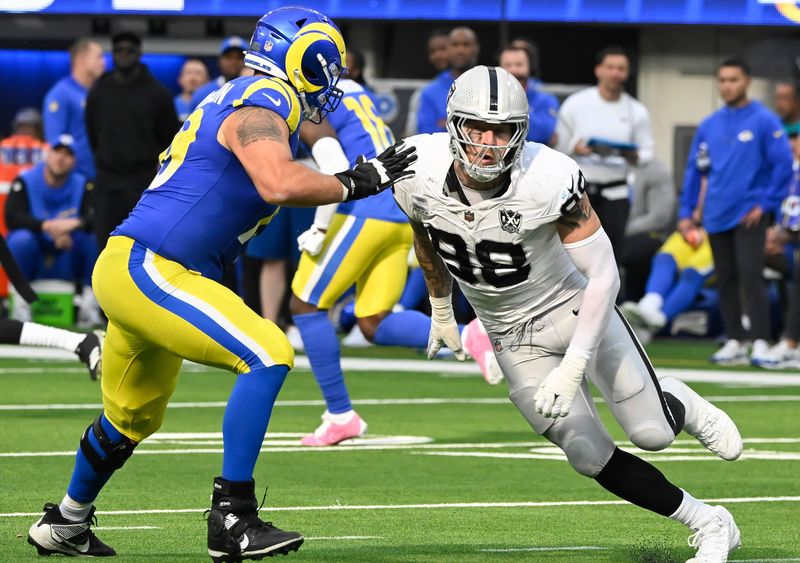 Oct 20, 2024; Inglewood, California, USA; Las Vegas Raiders defensive end Maxx Crosby (98) during the third quarter against the Los Angeles Rams at SoFi Stadium. Mandatory Credit: Robert Hanashiro-Imagn Images