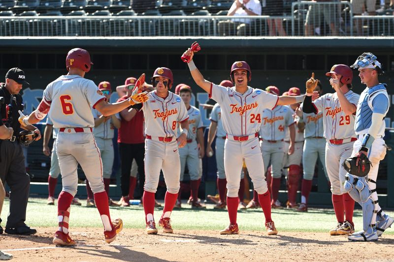 Jun 5, 2026; Chapel Hill, NC, USA; USC infielder Dean Carpentier (6) and teammates celebrate his grand slam against the North Carolina Tar Heels in the sixth inning at Boshamer Stadium. Mandatory Credit: Zachary Taft-Imagn Images