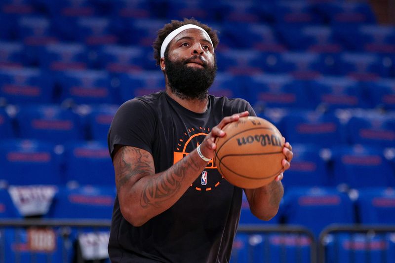 Apr 18, 2026; New York, New York, USA; New York Knicks center Mitchell Robinson (23) warms up before the 2026 NBA Playoffs game against the Atlanta Hawks at Madison Square Garden. Mandatory Credit: Vincent Carchietta-Imagn Images