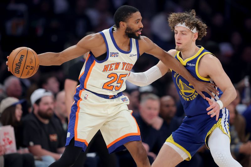 Mar 15, 2026; New York, New York, USA; New York Knicks guard Mikal Bridges (25) controls the ball against Golden State Warriors guard Brandin Podziemski (2) during the first quarter at Madison Square Garden. Mandatory Credit: Brad Penner-Imagn Images