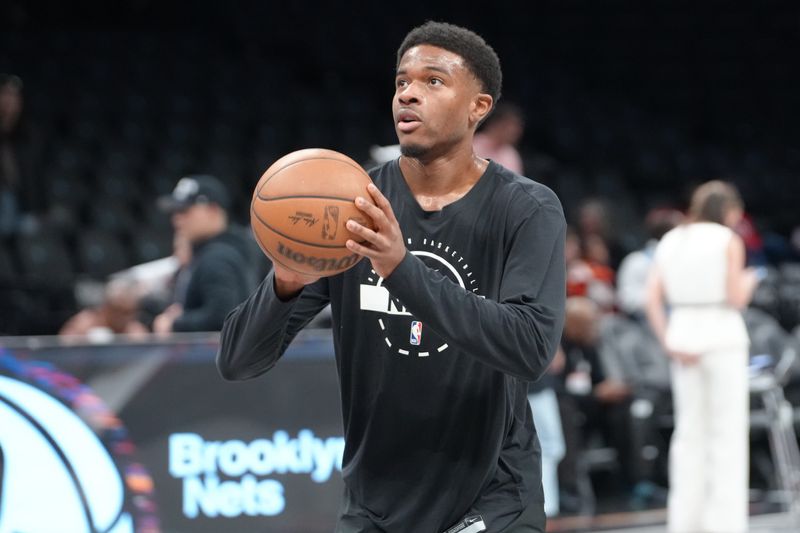 Apr 3, 2026; Brooklyn, New York, USA; Brooklyn Nets guard Ochai Agbaji (30) warms up prior to the game against the Atlanta Hawks at Barclays Center. Mandatory Credit: Gregory Fisher-Imagn Images