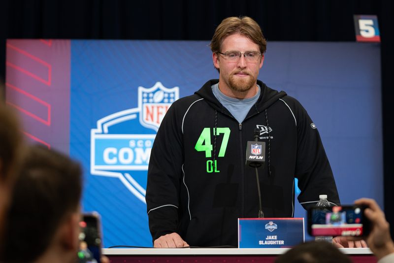 Feb 28, 2026; Indianapolis, IN, USA; Florida offensive lineman Jake Slaughter (OL47) speaks to members of the media during the NFL Combine at the Indiana Convention Center. Mandatory Credit: Jacob Musselman-Imagn Images