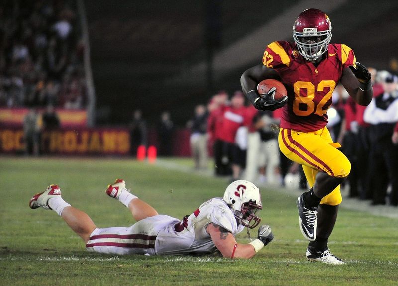 October 29, 2011; Los Angeles, CA, USA; Southern California Trojans tight end Randall Telfer (82) runs the ball against the Stanford Cardinal during the overtime period at the Los Angeles Memorial Coliseum. Mandatory Credit: Gary A. Vasquez-USA TODAY Sports
