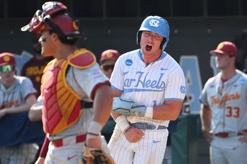 June 7, 2026; Chapel Hill, NC, USA; North Carolina Tar Heels infielder Cooper Nicholson (1) celebrates his run against the USC Trojans during the ninth inning at Boshamer Stadium. Mandatory Credit: Zachary Taft-Imagn Images
