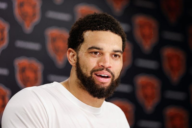 Jun 11, 2026; Lake Forest, IL, USA; Chicago Bears quarterback Caleb Williams (18) speaks during Minicamp at Halas Hall. Mandatory Credit: Kamil Krzaczynski-Imagn Images