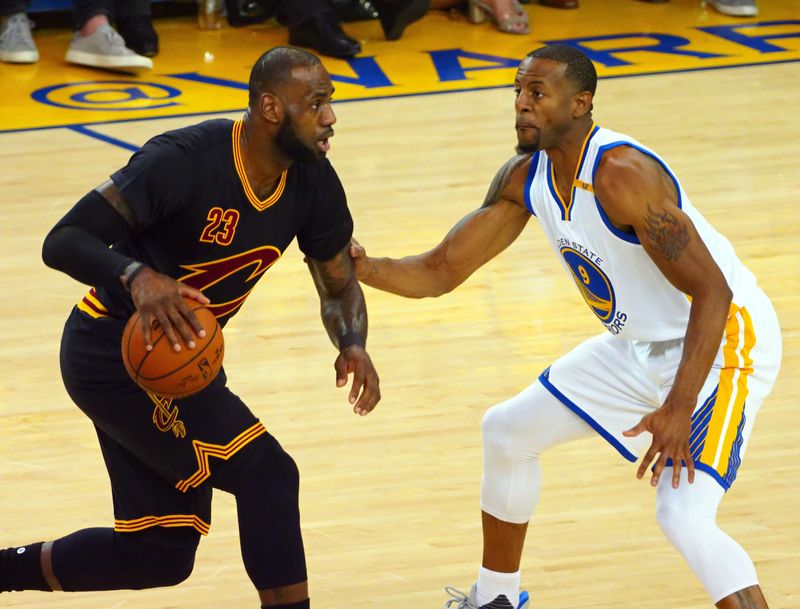 Jun 12, 2017; Oakland, CA, USA; Cleveland Cavaliers forward LeBron James (23) handles the ball against Golden State Warriors forward Andre Iguodala (9) during the first quarter in game five of the 2017 NBA Finals at Oracle Arena. Mandatory Credit: Kelley L Cox-USA TODAY Sports