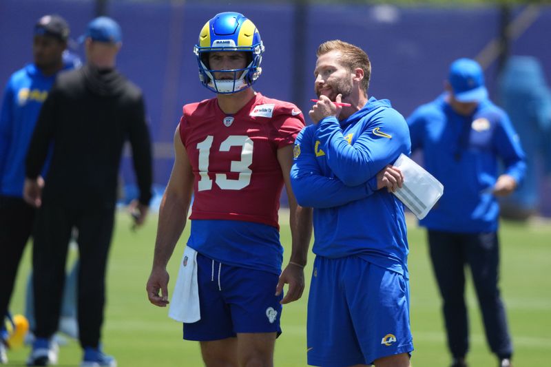 Jun 2, 2026; Woodland Hills, CA, USA; Los Angeles Rams quarterback Stetson Bennett IV (13) and coach Sean McVay during organized team activities at Rams Practice Facility. Mandatory Credit: Kirby Lee-Imagn Images