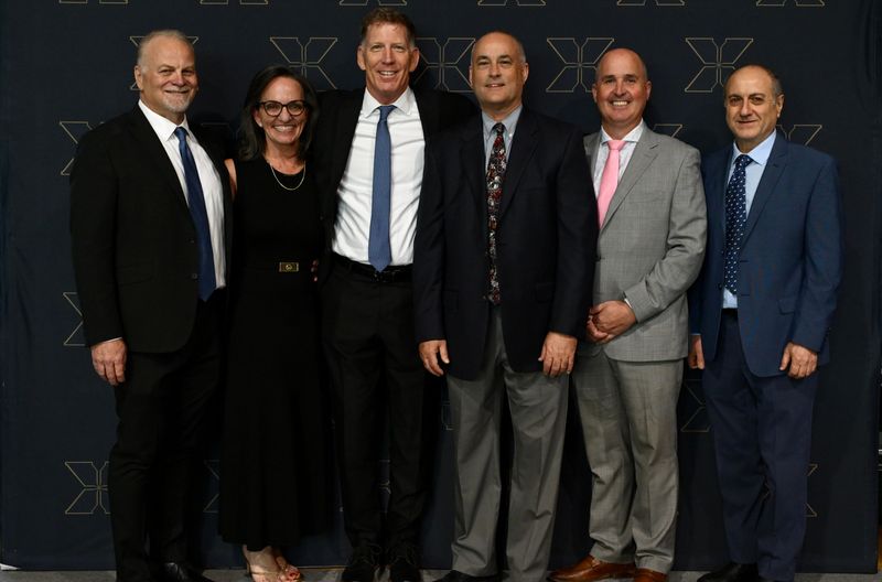 Xavier past and present leadership: Mike Rover, DoeDee Rover, Chris Alling, Mark Granger, Mark Campbell and Fadi Germanos attend Xavier College Preparatory's annual Companions Dinner on May 1, 2026.
