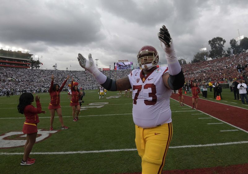 Jan 2, 2017; Pasadena, CA, USA; USC Trojans offensive tackle Zach Banner (73) reacts during the 103rd Rose Bowl against the Penn State Nittany Lions at Rose Bowl. USC defeated Penn State 52-49 in the highest scoring game in Rose Bowl history. Mandatory Credit: Kirby Lee-USA TODAY Sports