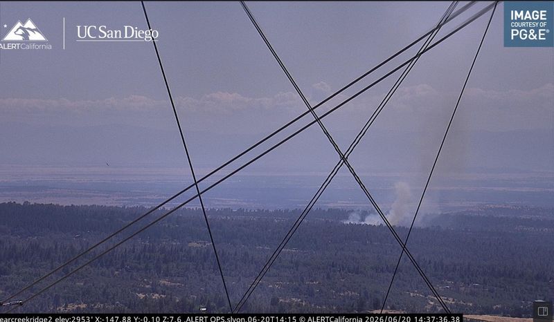 Smoke from the Lava Fire is shown on an outdoor camera pointing toward Shingletown on June 20, 2026.