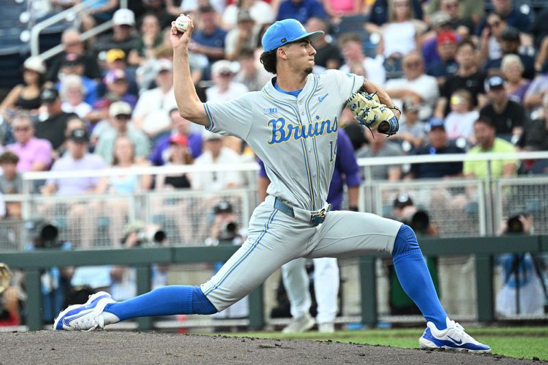 Jun 16, 2025; Omaha, Neb, USA;  UCLA Bruins starting pitcher Landon Stump (14) throws against the LSU Tigers during the first inning at Charles Schwab Field. Mandatory Credit: Steven Branscombe-Imagn Images