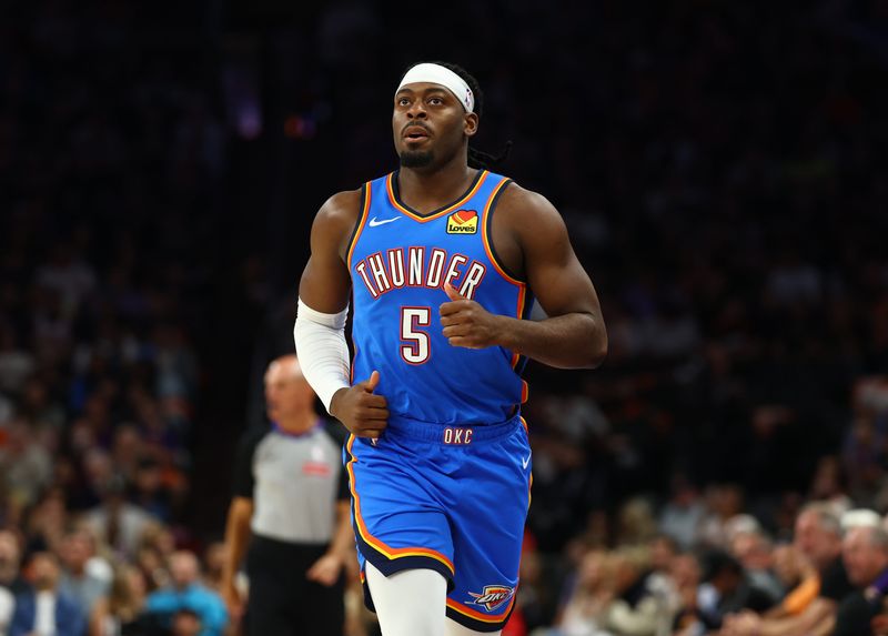 Apr 27, 2026; Phoenix, Arizona, USA; Oklahoma City Thunder guard Luguentz Dort (5) against the Phoenix Suns during game four of the first round of the 2026 NBA Playoffs at Mortgage Matchup Center. Mandatory Credit: Mark J. Rebilas-Imagn Images