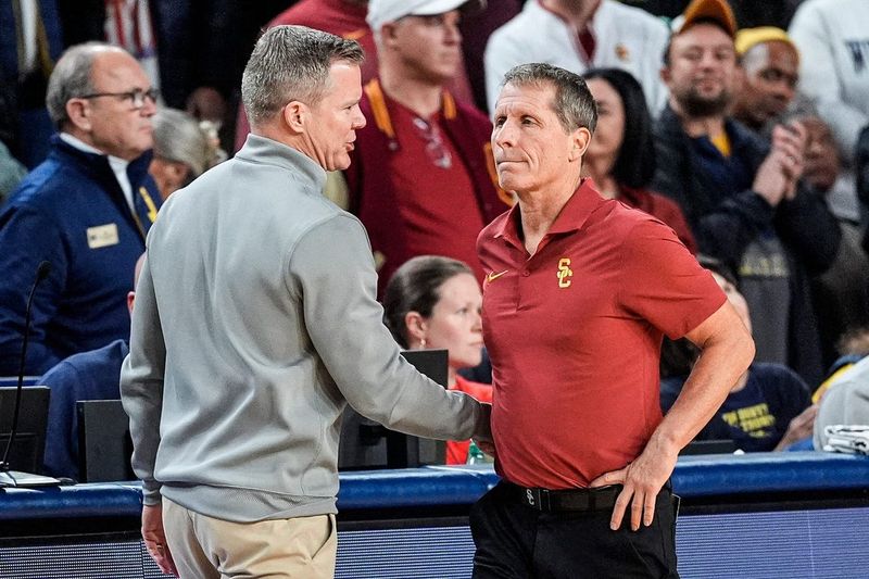 Michigan head coach Dusty May shakes hands with USC head coach Eric Musselman after 96-66 win over USC at Crisler Center in Ann Arbor on Friday, Jan. 2, 2026.