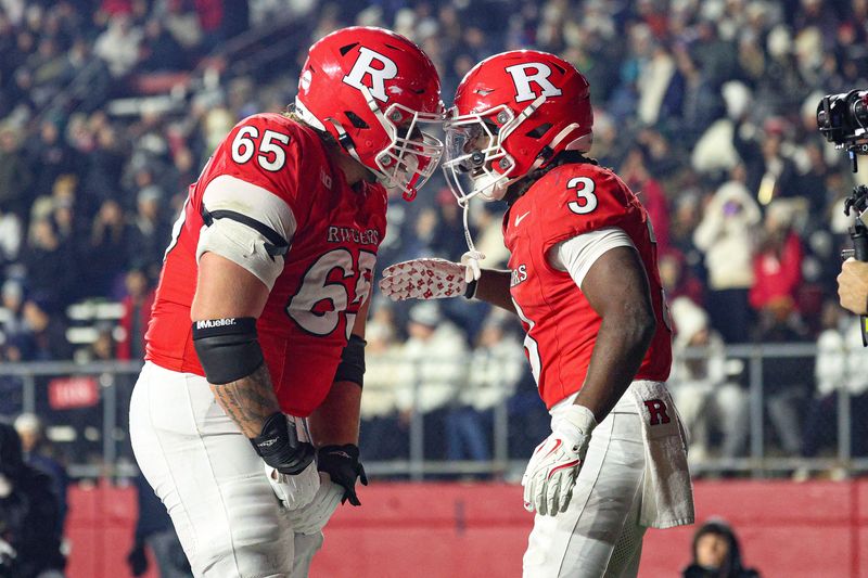 Nov 29, 2025; Piscataway, New Jersey, USA; Rutgers Scarlet Knights running back Antwan Raymond (3) celebrates his touchdown reception with Rutgers Scarlet Knights offensive lineman Bryan Felter (65) during the second half against the Penn State Nittany Lions at SHI Stadium. Mandatory Credit: Vincent Carchietta-Imagn Images