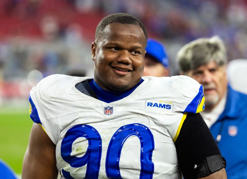 Dec 7, 2025; Glendale, Arizona, USA; Los Angeles Rams  defensive end Tyler Davis (90) against the Arizona Cardinals at State Farm Stadium. Mandatory Credit: Mark J. Rebilas-Imagn Images