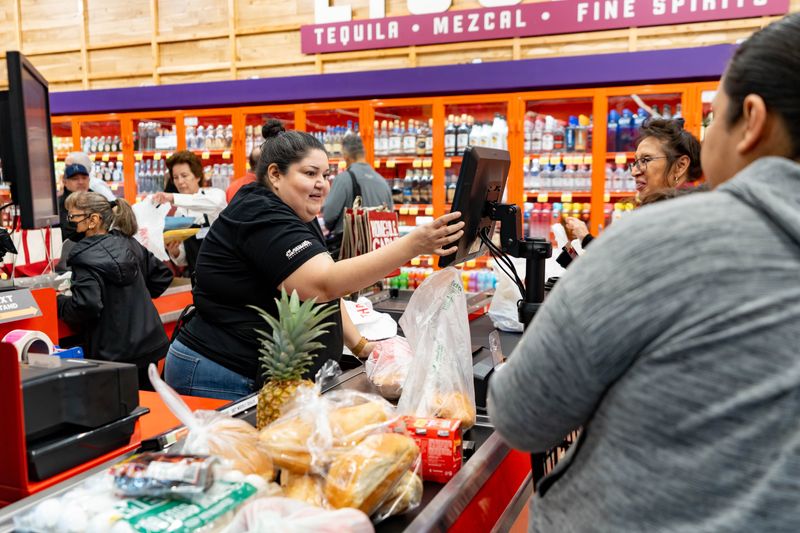 People shop for groceries during the grand opening of the first Arizona location of Vallarta Supermarkets in Glendale on Jan. 14, 2026.