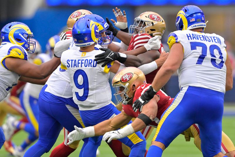 Sep 17, 2023; Inglewood, California, USA; The San Francisco 49ers defense forces an incomplete pass by Los Angeles Rams quarterback Matthew Stafford (9) in the second half at SoFi Stadium. Mandatory Credit: Jayne Kamin-Oncea-USA TODAY Sports