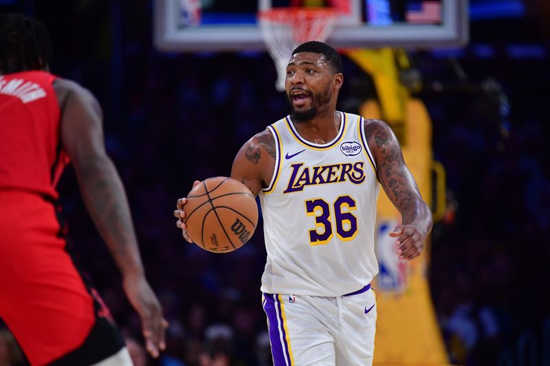 Dec 25, 2025; Los Angeles, California, USA; Los Angeles Lakers guard Marcus Smart (36) moves the ball up court against the Houston Rockets during the first half at Crypto.com Arena. Mandatory Credit: Gary A. Vasquez-Imagn Images