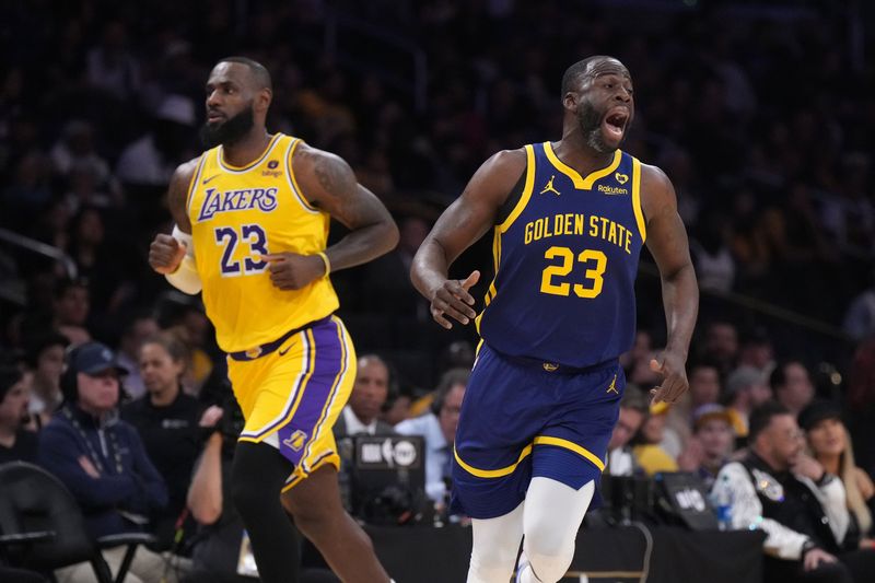 Apr 9, 2024; Los Angeles, California, USA; Golden State Warriors forward Draymond Green (right) and Los Angeles Lakers forward LeBron James react in the first half at Crypto.com Arena. Mandatory Credit: Kirby Lee-USA TODAY Sports