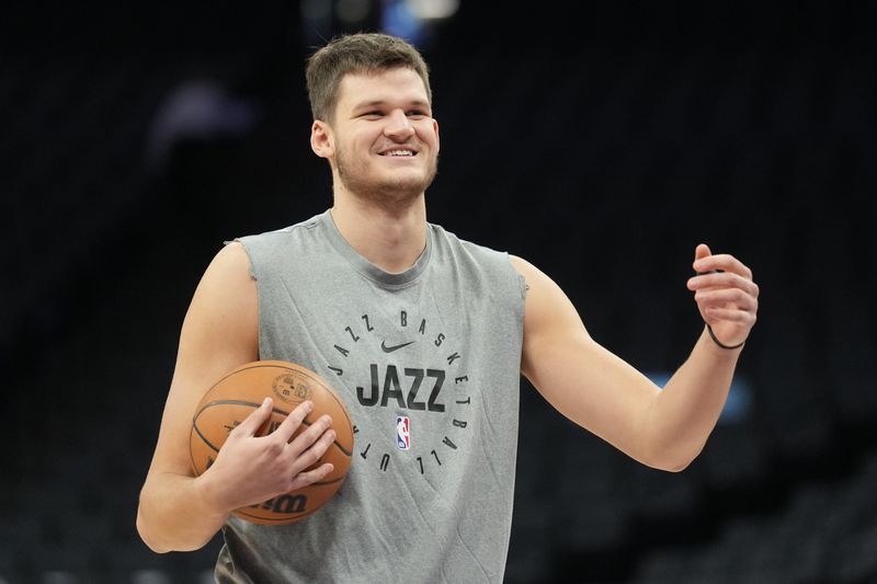 Dec 8, 2024; Sacramento, California, USA; Utah Jazz center Walker Kessler (24) before the game against the Sacramento Kings at Golden 1 Center. Mandatory Credit: Darren Yamashita-Imagn Images