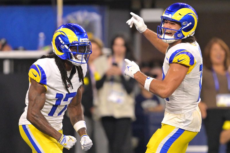 Nov 23, 2025; Inglewood, California, USA; Los Angeles Rams wide receiver Davante Adams (17) celebrates with wide receiver Puka Nacua (12) after a touchdown against the Tampa Bay Buccaneers at SoFi Stadium. Mandatory Credit: Jayne Kamin-Oncea-Imagn Images