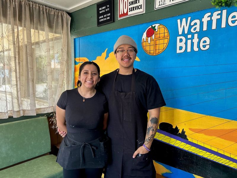 Waffle Bite owner Mercedes Velazquez, left, stands with her husband, John Seachao, at the entrance to their family-run restaurant in south Redding on Thursday, July 2, 2026.