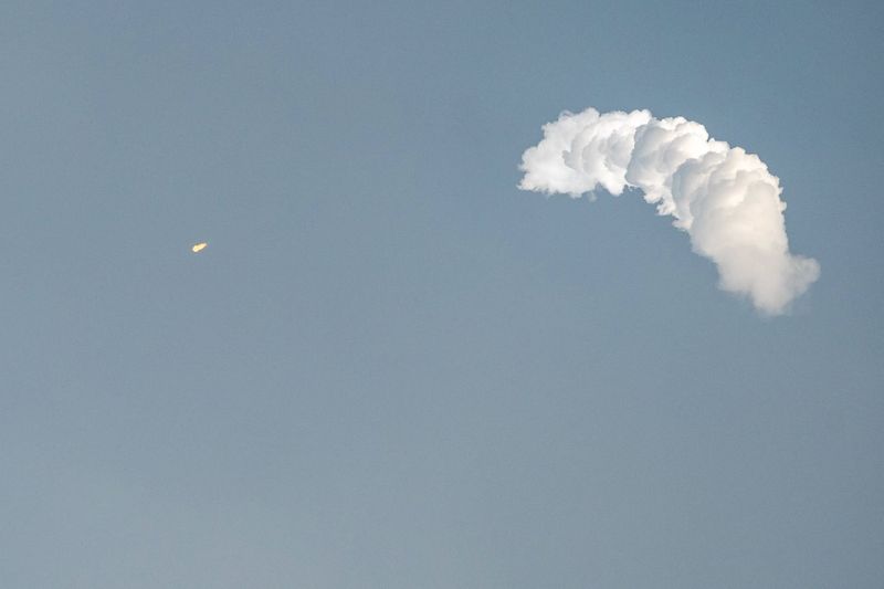 A SpaceX Falcon 9 rocket is photographed in the sky shortly after launching July 10 from the Vandenberg Space Force Base in California.